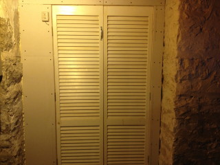 The doors to the root cellar. Thankfully not as dungeon-y as I thought they'd be.